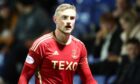 Aberdeen defender Richard Jensen in action during the 2-1 Viaplay Cup quarter-final defeat of Ross County. Image: Shutterstock.