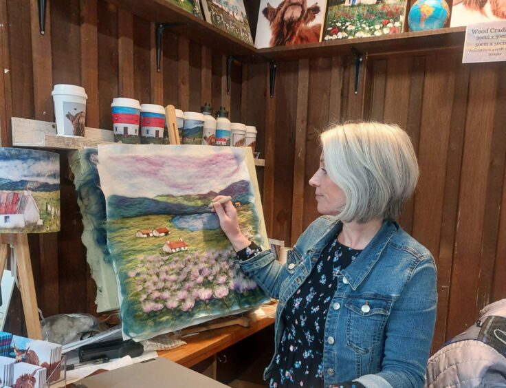 Karen in her gallery and shop.