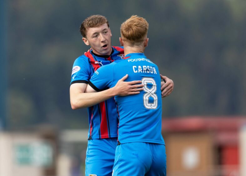 Nathan Shaw celebrates with David Carson after scoring against Dunfermline
