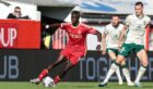 Aberdeen's Pape Habib Gueye playing against Hibs in September. Image: SNS.