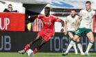 Aberdeen's Pape Habib Gueye playing against Hibs in September. Image: SNS.