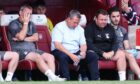 Billy Dodds and his coaching team during the SPFL Trust Trophy defeat to Arbroath. Image: SNS