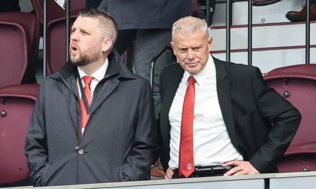 Aberdeen chairman Dave Cormack, right, and chief executive Alan Burrows during a Premiership match.