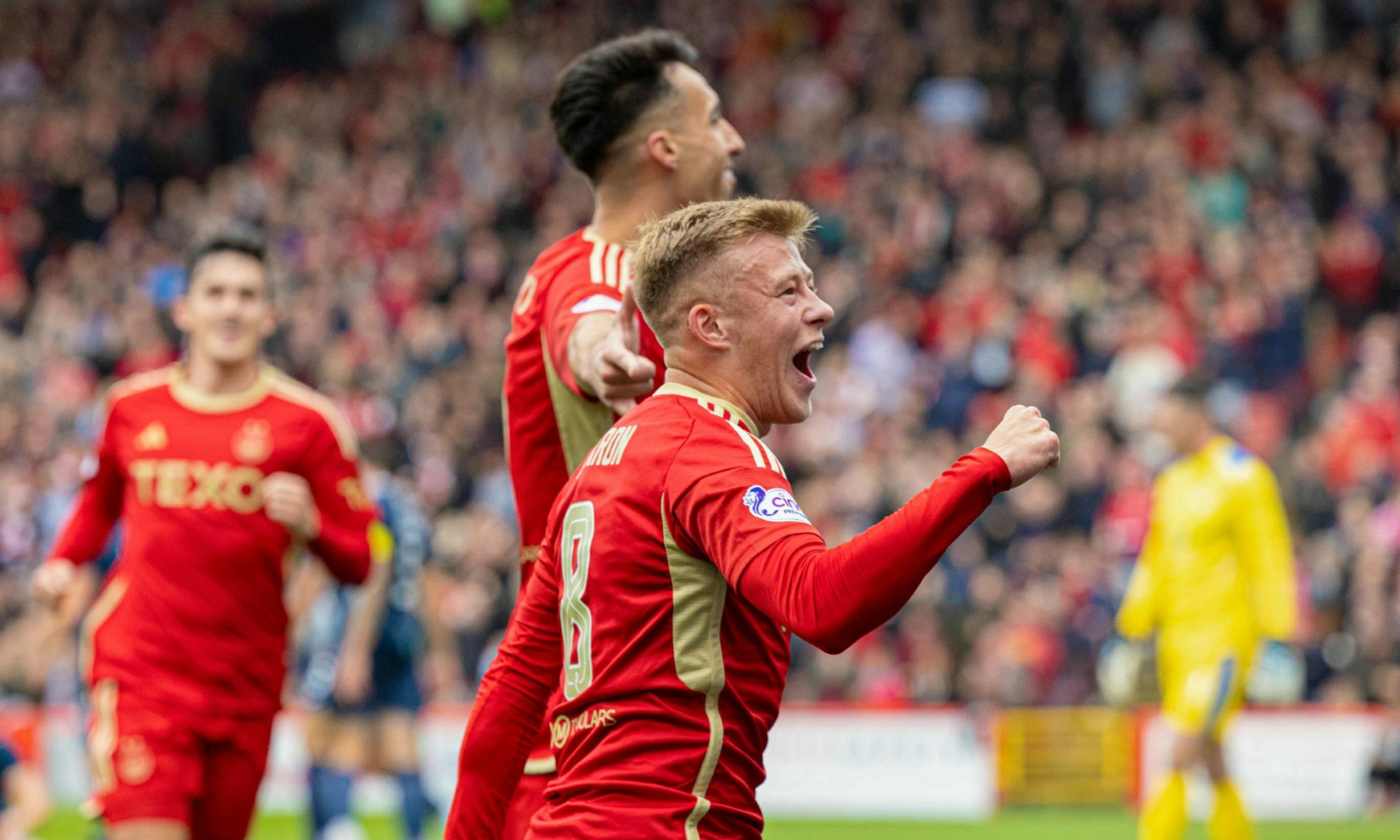 Aberdeen midfielder Connor Barron celebrates after Bojan Miovski scores to make it 1-0 against Ross County. 