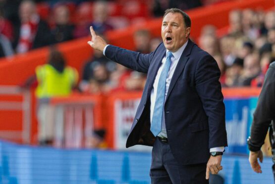 Ross County manager Malky Mackay shouts instructions to his players in the 4-0 defeat by Aberdeen. Image: SNS