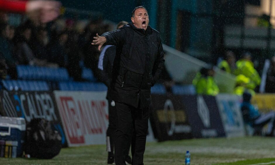 Ross County manager Malky Mackay shouting at the side of the pitch