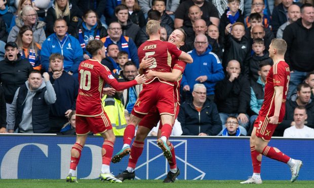 Stefan Gartenmann celebrates making it 1-0 Aberdeen against Rangers. Image: SNS.