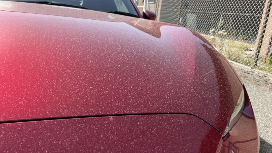Close up of bonnet of car covered in Saharan dust in Aberdeen.