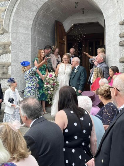 Sharon Travers and Martin Kelly leaving church
