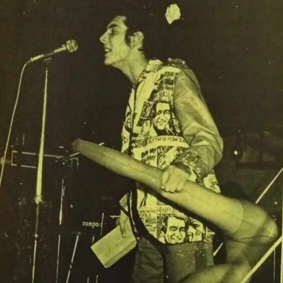 Sid Ozalid on stage supporting The Specials in the '80s.