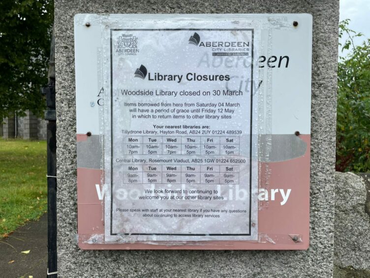 A notice outside Woodside Library informs of the closure and where the nearest libraries are.