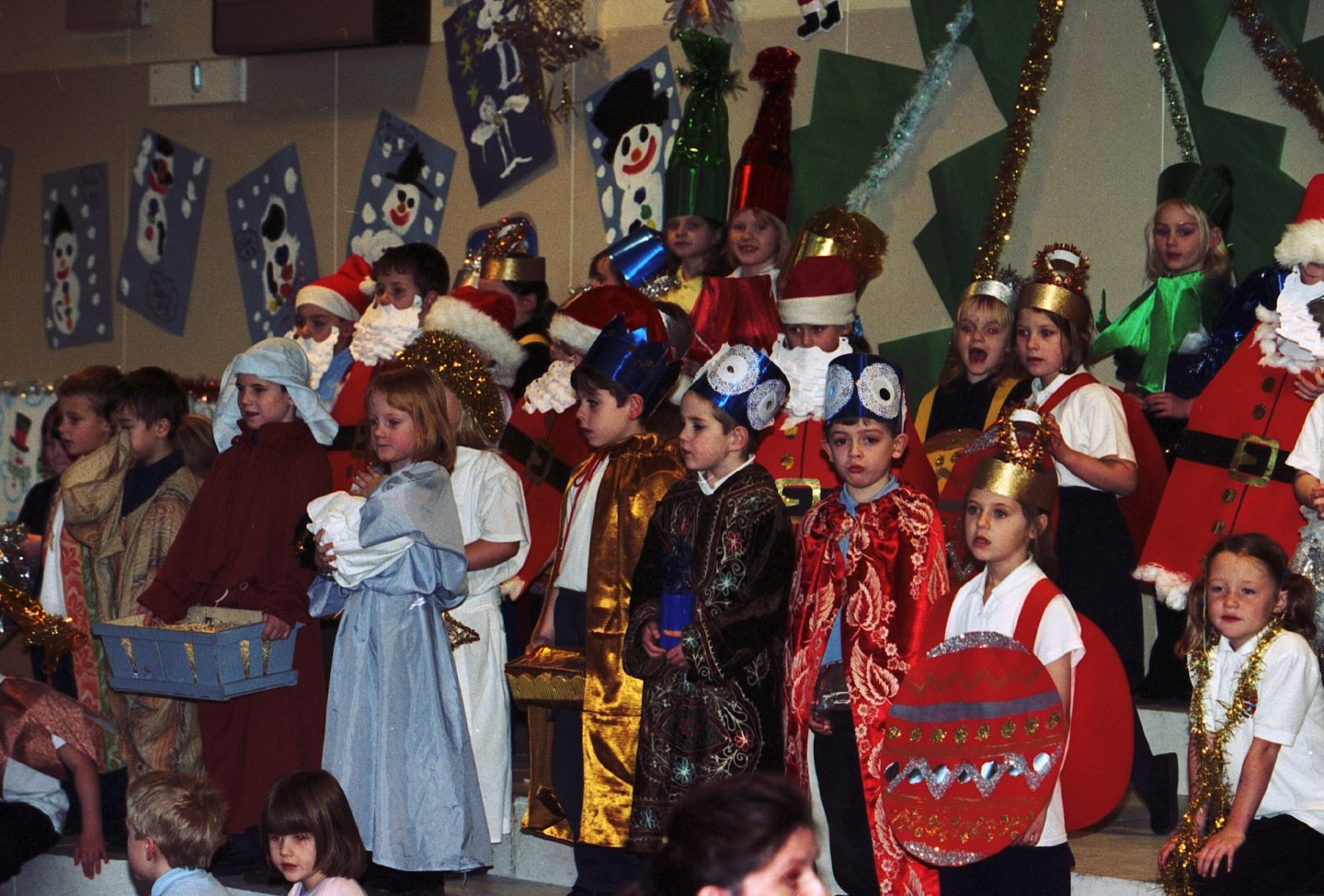 Group of pupils in homemade costumes for the school's nativity play.