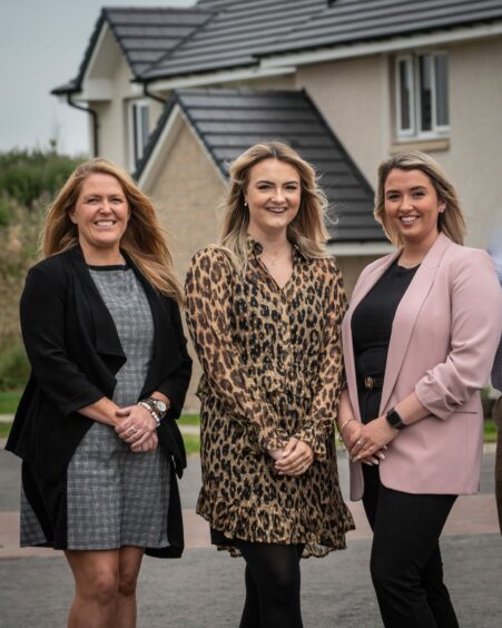 l-r Stacy Angus, Osprey's CEO, with Niamh Johnston and Lauren Allan outside one of Osprey's homes at Leathan Green Portlethen, near Aberdeen.