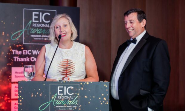 Ann and Howard Johnson, of Blaze Manufacturing Solutions, collecting the service and solutions award in Dubai.