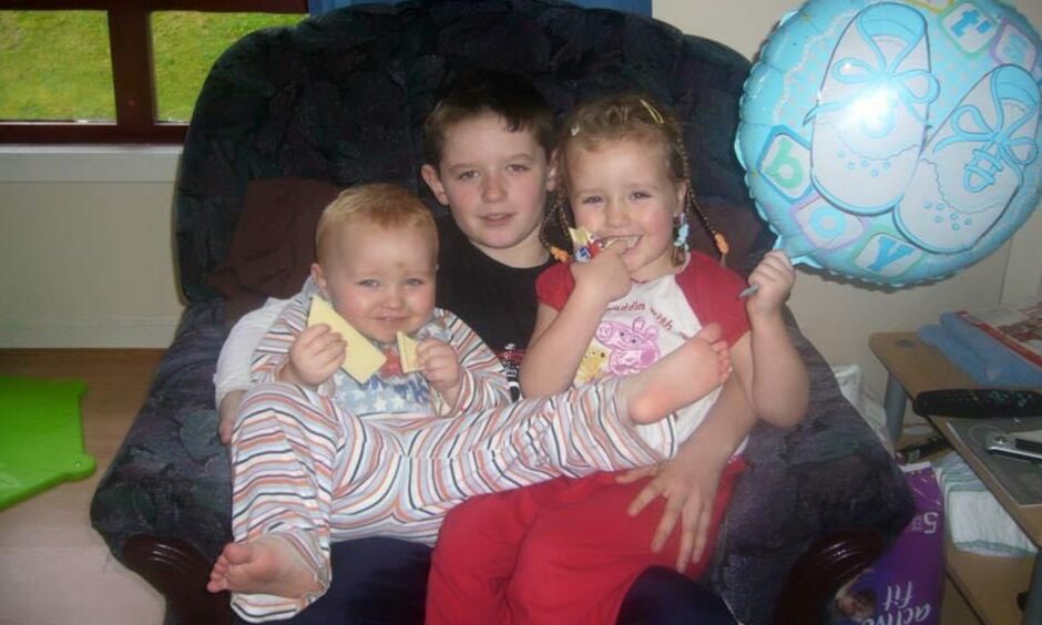 Arran Watson [centre] with his niece Brooke [right] and his nephew Neo [left].
