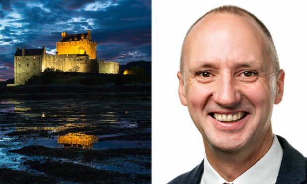 Chris Taylor, of VisitScotland, alongside one of the north's most iconic heritage assets, Eilean Donan Castle, near Dornie.