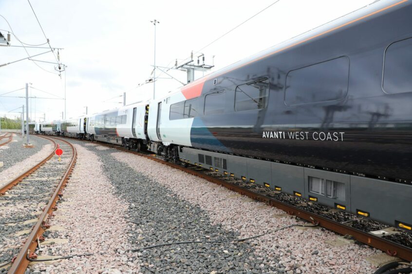 New livery for Avanti West Coast's trains goes on show for the first time at manufacturer Hitachi's Newton Aycliffe facility in north-east England. 
