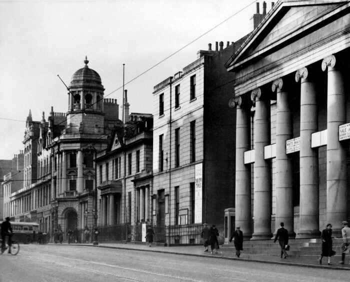 The columns of Aberdeen Music Hall on Union Street still stand proud, but the granite buildings to the left, including Crimonmogate's House have all been replaced.