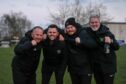 The Culter management team celebrating winning the league last season. From left to right: first-team coach Ian Finnie, manager Lee Youngson, assistant manager Craig Stephenson and first-team coach James Milne. Image: Darrell Benns/DC Thomson.