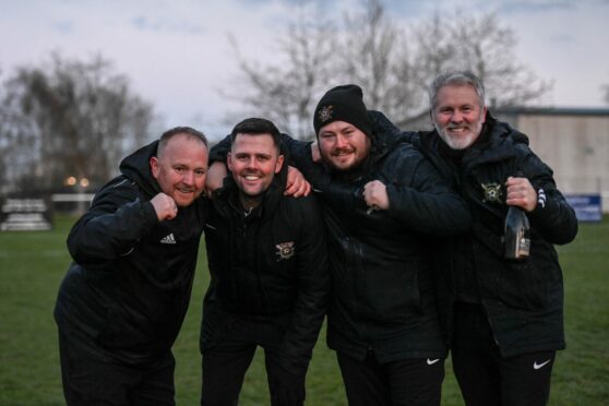 The Culter management team celebrating winning the league last season. From left to right: first-team coach Ian Finnie, manager Lee Youngson, assistant manager Craig Stephenson and first-team coach James Milne. Image: Darrell Benns/DC Thomson.