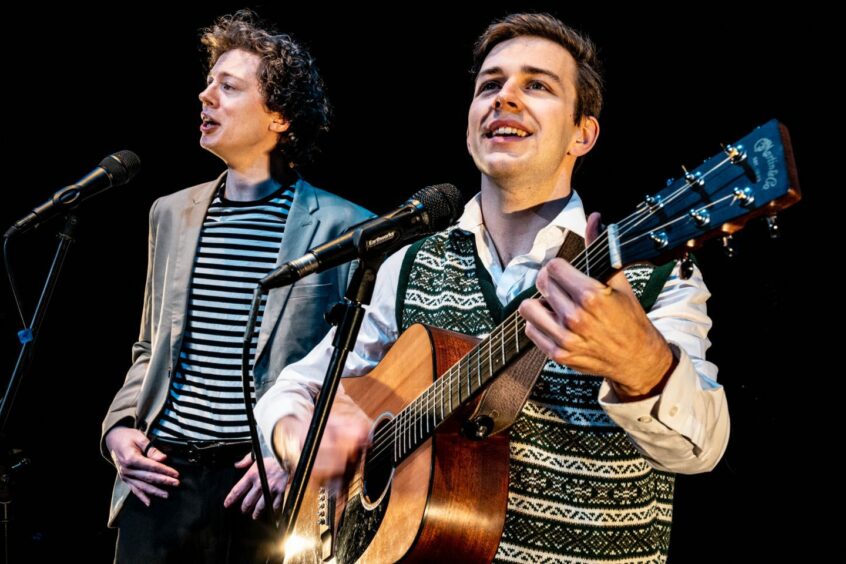 Oliver Cave as Art Garfunkel and Will Sharp as Paul Simon