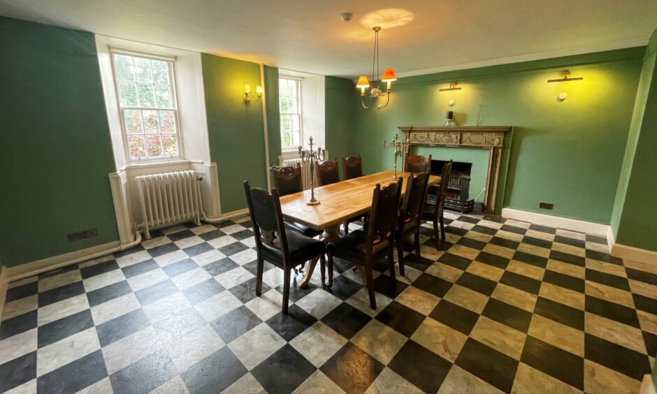 Dining room with a marble checkered floor