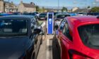 Cars hooked up at one of the ChargePlace evolt chargers in Moray. Image: Jasperimage