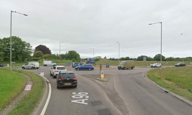 Traffic approaching Findhorn roundabout at Forres, Moray.