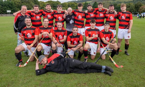 The Glenurquhart team after clinching promotion back to the Premiership. Image: Neil Paterson.