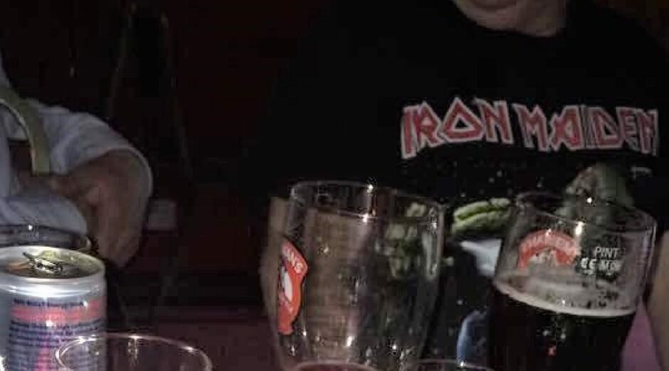 Potential new witness in the Cheese Wire Murder investigation wearing an Iron Maiden t-shirt at Wilson’s Sports Bar on Aberdeen’s Market Street in 2015.