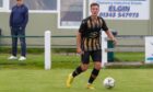 Isaac Evans, pictured playing for Huntly against Buckie Thistle at the weekend. Picture courtesy of George Mackie/Still Burning Photography