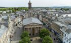 Aerial view of St Giles' Church looking across Elgin High Street and rest of town.