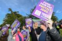 Lecturers and support staff take to the picket line outside Moray College in Elgin to protest against a pay offer linked to compulsory redundancies. Image: Jason Hedges/DC Thomson