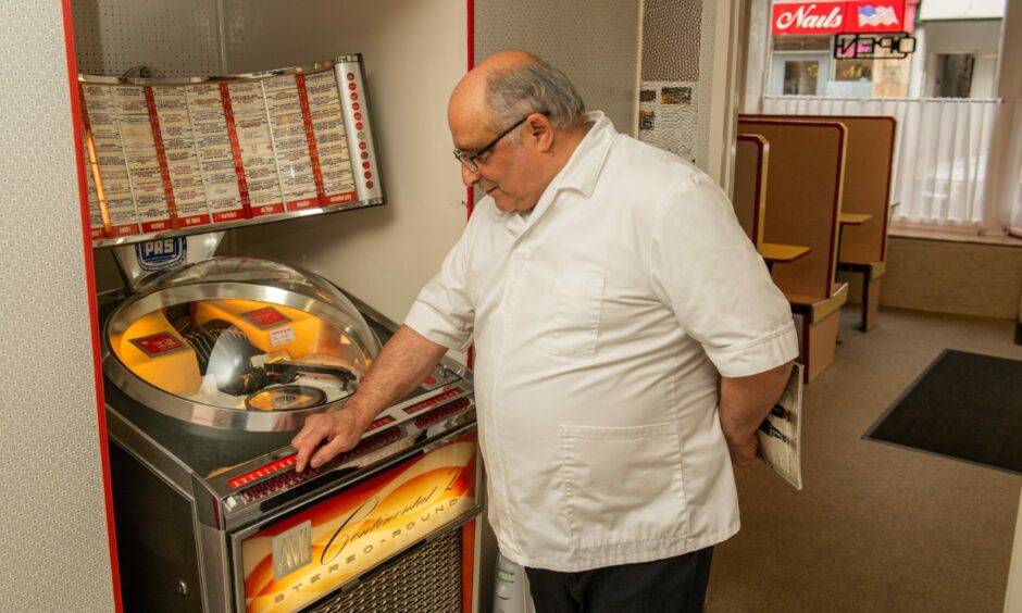 Michael Miele at the controls of the jukebox.