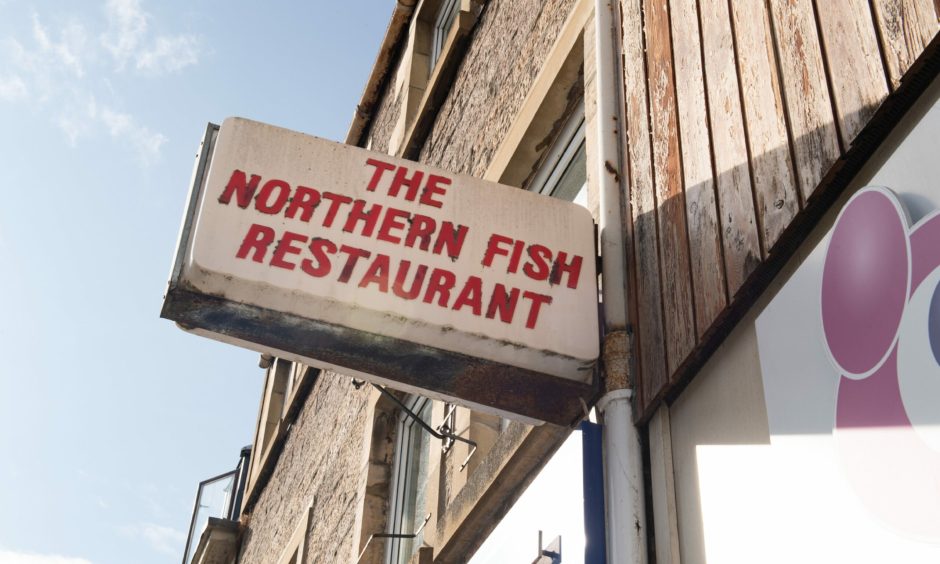 Northern Fish Restaurant street sign. 