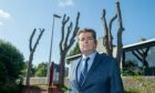 Colin Mackay has slammed the "butchery" of the trees on Spademill Road. Image: Kenny Elrick/DC Thomson