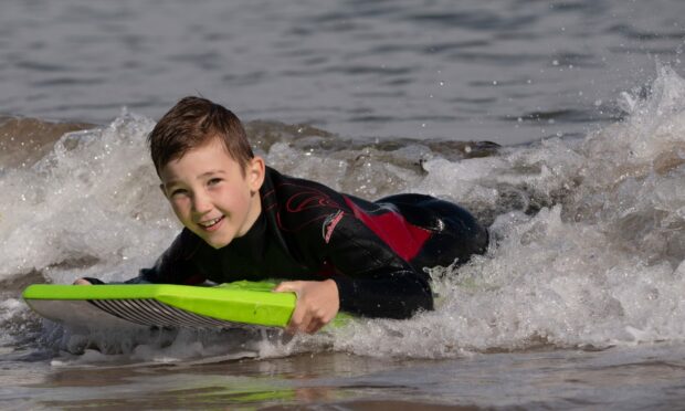 Ethan Varday, 7 enjoying the weather at Aberdeen Beach. Image: Kenny Elrick/DC Thomson