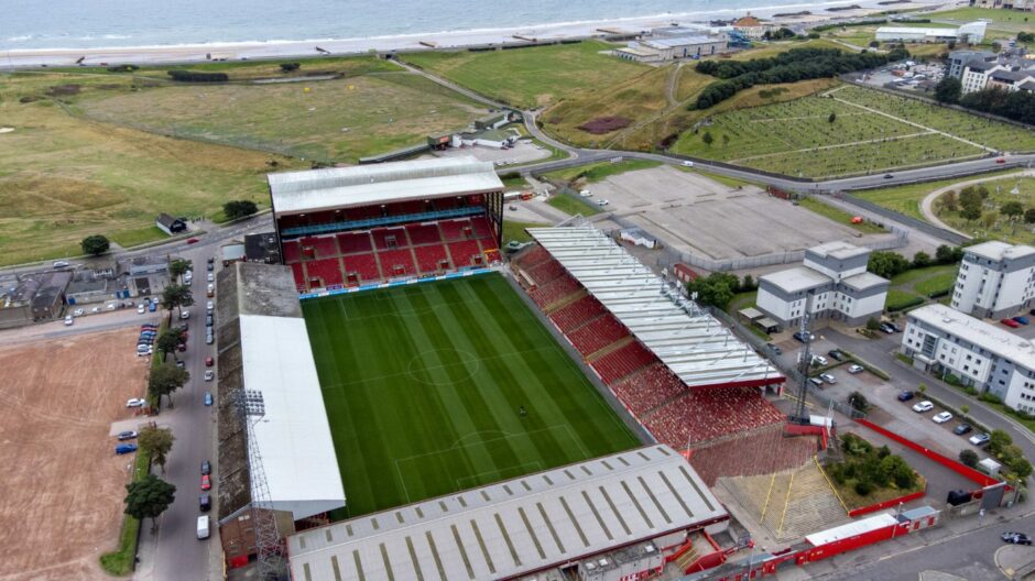 The image shows Pittodrie, the current Dons stadium in Aberdeen.