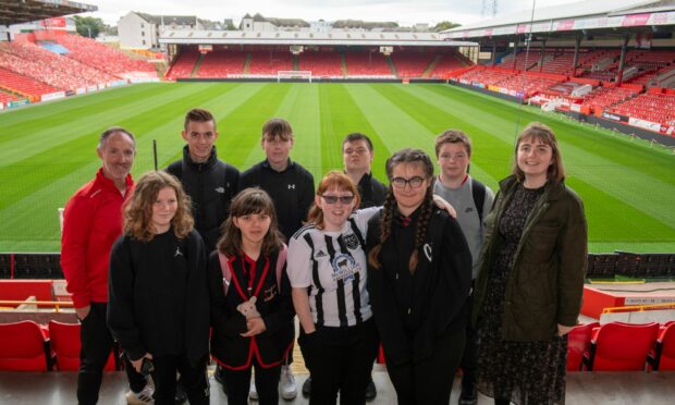 The group from Fraserburgh Academy at Pittodrie stadium