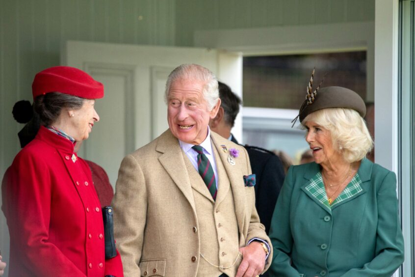 King Charles, Queen Camilla and The Princess Royal at the Braemar Gathering.
