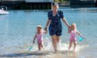 Anna and Isla with mum Stephanie Campbell at Stonehaven Harbour. Image: Kath Flannery/DC Thomson.