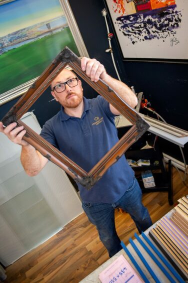 Kevin Dundas in the frame in his Rosemount shop. 
