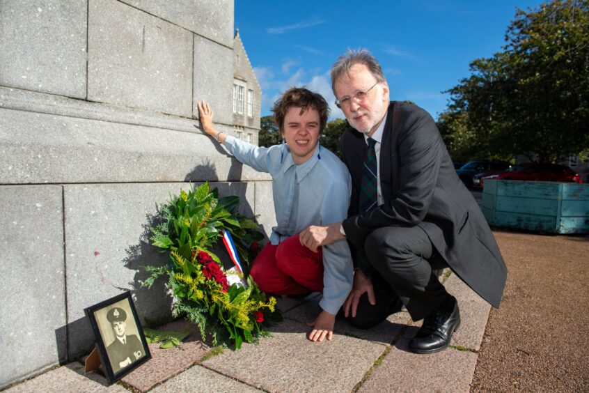 Nuala and Graham Watt with the wreath they laid at Lord Byron's statue