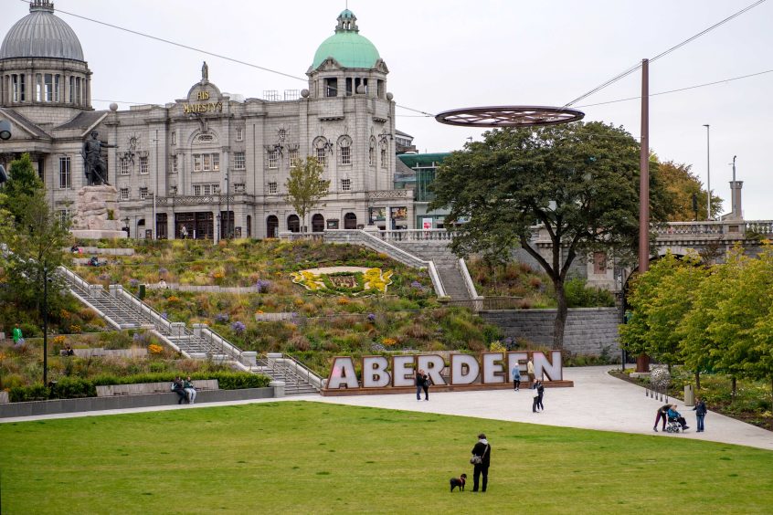 Aberdeen sign pictured in Union Terrace Gardens with His Majesty's Theatre in the background 
