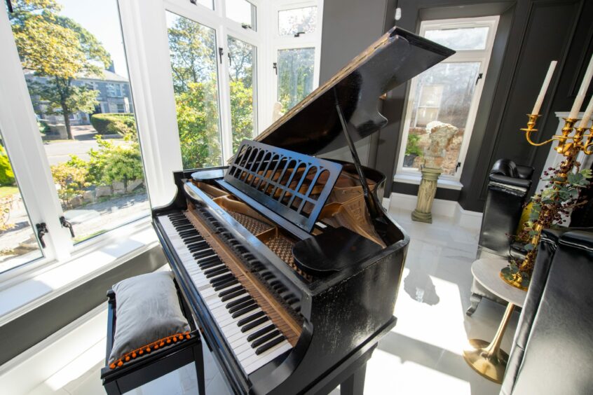 A grand piano in Mallard House in Aberdeen