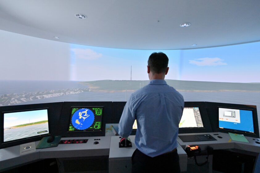 Ewan Rattray, when he worked as deputy harbour master at Port Aberdeen, using a simulator in the new South Harbour.