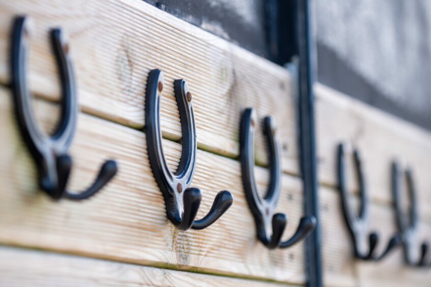 Coat hangers made from horseshoes