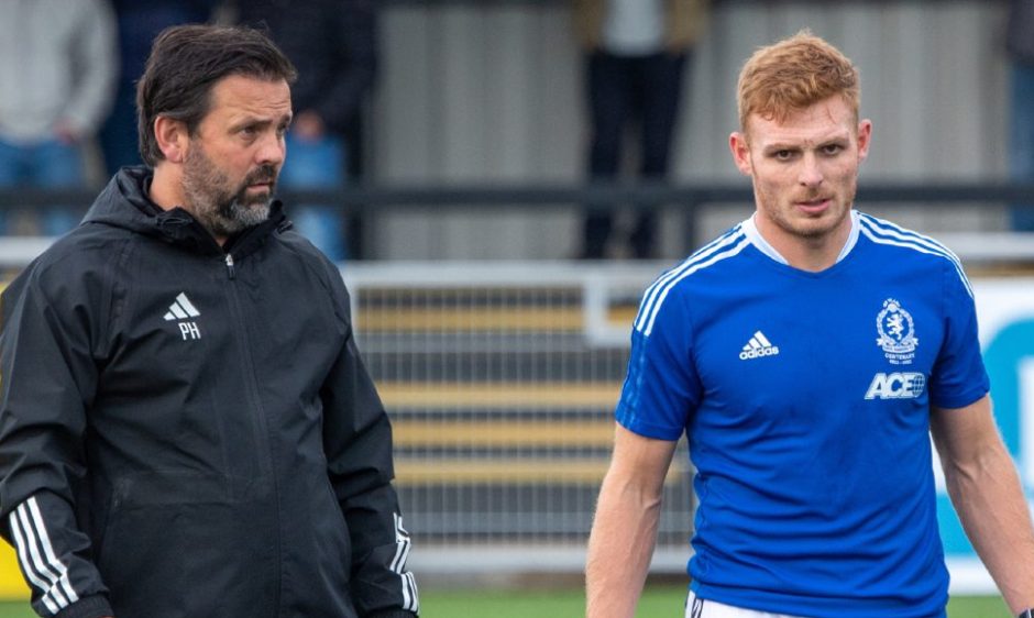 Cove Rangers manager Paul Hartley and midfielder Fraser Fyvie at Balmoral Stadium.