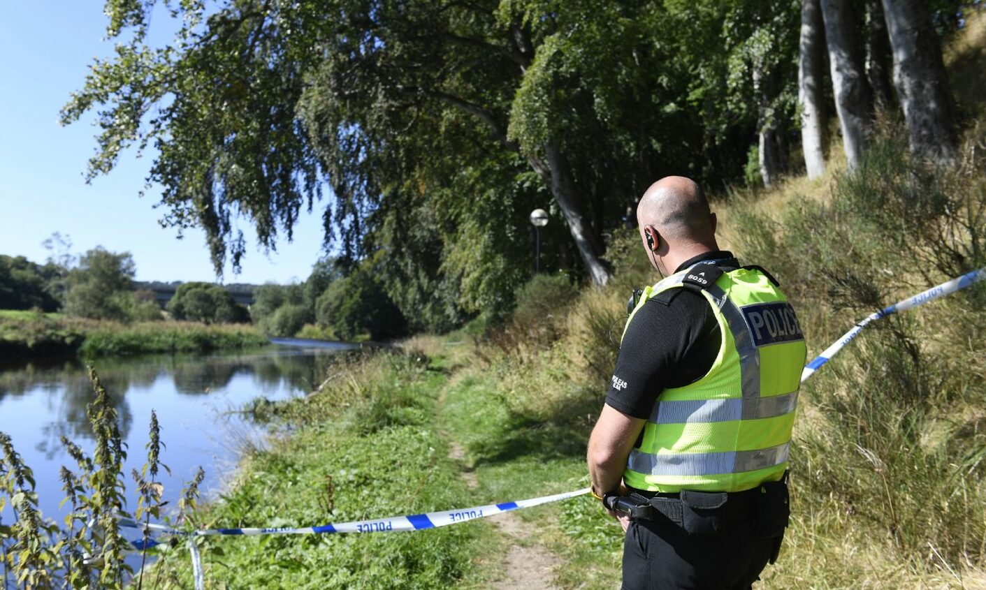 Police at riverside path in Inverurie.