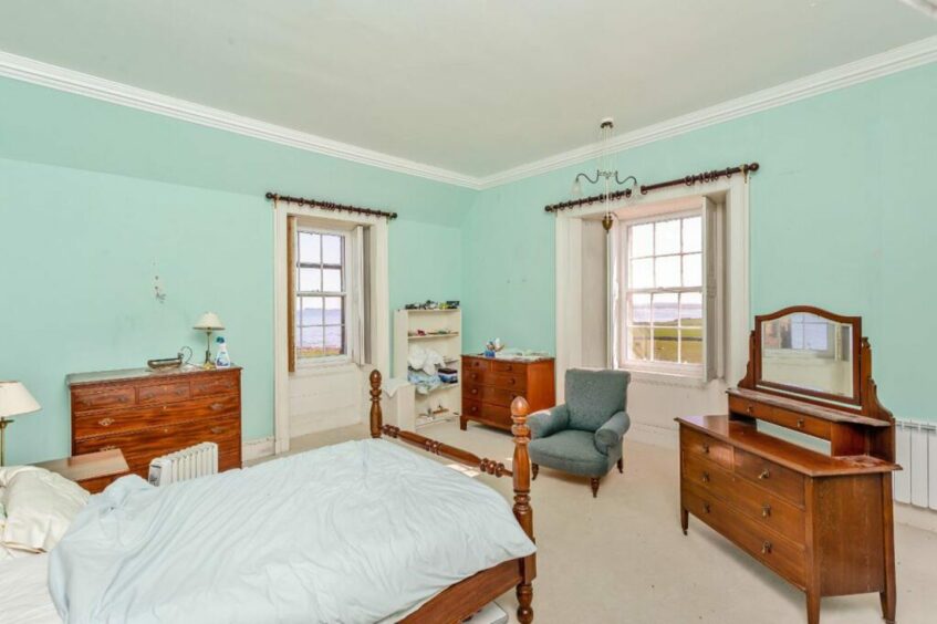 Keiss Castle in Caithness is being offered for sale by Strutt and Parker. Pictured is tone of the castle bedrooms.